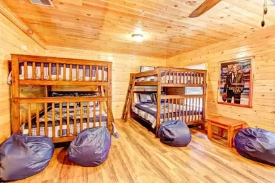 kid room with bunk beds and bean bags all american cabin