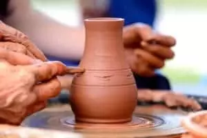 people making pottery