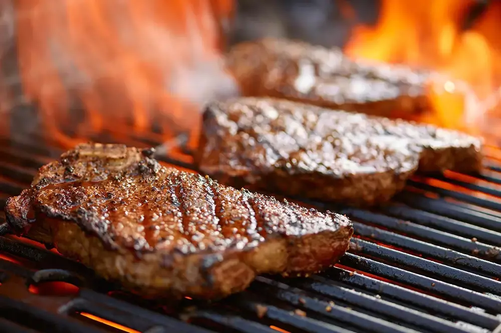 steaks on the grill