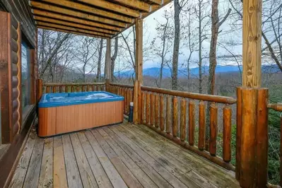 Hot tub on deck of Gatlinburg TN winter cabin