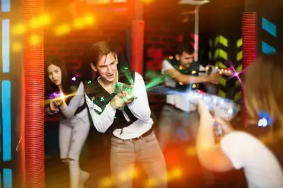 teens playing laser tag