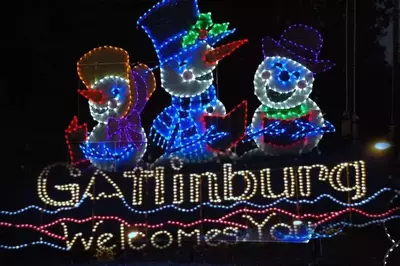 Photo of a Christmas lights display in Gatlinburg with happy snowmen.