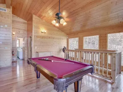 Pool table at Smokey Mountain Paradise a Gatlinburg Cabin Rental