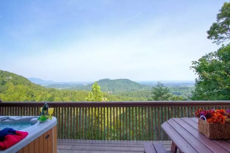 Breathtaking photo taken on the deck of onoe of our Gatlinburg cabins with a mountain view.