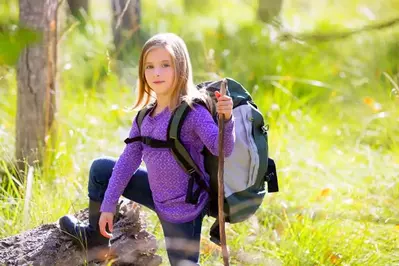 young girl hiking in the national park