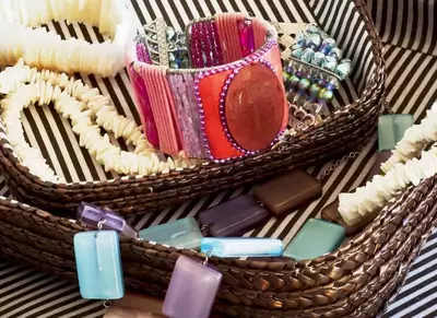 basket of hand-made jewelry at crafts show