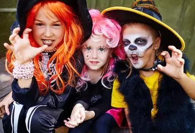 Young girls dressed up for Halloween