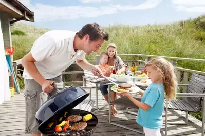 family cooking in a Gatlinburg cabin rental