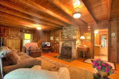 Rustic fireplace and living room at Bear Creek