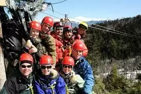 Happy family ziplining in Gatlinburg. 